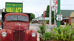 Chandler Oklahoma old historical Route 66 old Phillips 66 gas station and 50s rusted truck kicks on Route 66 Stock Footage