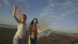 Women on beach Stock Footage
