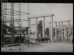 Children playing in the sand, close ups of workers, city scenes and bookshop. Algiers, 1961 Stock Footage