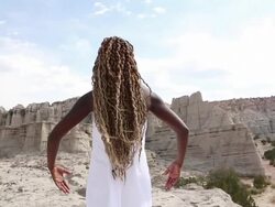 MS Shot of woman meditating in desert / Santa Fe, New Mexico, United States Stock Footage