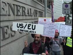 Activists hand out anti-WTO leaflets to US, EU consulates, Portman speaks News Clip