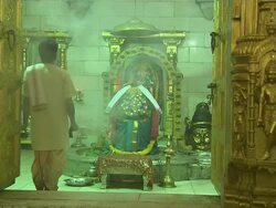Block shot priest performing aarti in somnath temple veraval gujarat Stock Footage