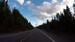 POV from car as it dives along mountain road Stock Footage