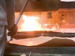 MS PAN Melted raw steel in founder filling in molds / Langenfeld, North Rhine-Westphalia, Germany Stock Footage