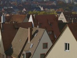 MS Shot of houses rooftops in city / Nuremberg, Bavaria, Germany Stock Footage