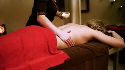 Attractive woman on a chic oil massage therapy Stock Footage