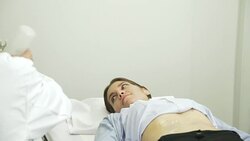 Doctor Performing Sonogram Stock Footage