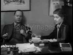 1937: JOKE WRITERS: Two unidentified men at desk in office. DRAMATIZATION: 'Kingsley and Kingsley script counsellors' on door. 'Kingsley & Kingsley' in office, SOT female reading joke, male 'putting spin on it' reworking punch line. Instructional Video