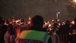 CLEAN : Red Cross gives supplies to migrants in Slovenia News Clip