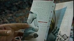 Robots compete in world cup contest News Clip