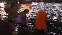 CLEAN : Thousands bathe in India s holy Ganga to mark Hindu festival News Clip