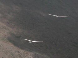 2010 AERIAL Gliders flying over rocky Andes mountains / Santiago de Chile, Gran Santiago, Chile Stock Footage