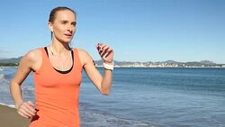Active day - running on beach Stock Footage