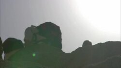 Hikers explore the ruins of Shenshef, Egypt. Stock Footage