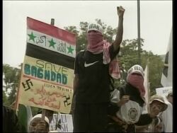 VOICED Indonesia's largest demo against war in Iraq, and protesters in Beijing News Clip