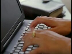 CU hands typing on laptop Stock Footage