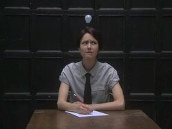 Young woman has an idea and the lightbulb above her head is illuminated Stock Footage