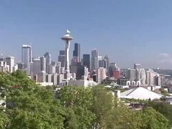 Extreme Long Shot zoom-in-The Space Needle marks Seattle's skyline in downtown near Starbucks headquarters. / Seattle, Washington, USA Stock Footage