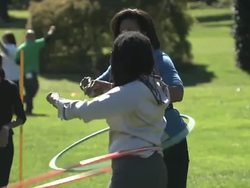 Michelle Obama spinning a hula hoop News Clip