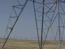 powertower with windmills in the back ground Stock Footage