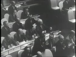Soviet Premier Nikita Khrushchev and other Soviet delegates pound their fists during a United Nations meeting. News Clip