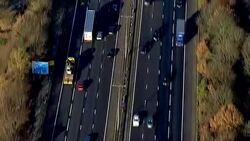 Aerials of morning traffic on the M25 News Clip