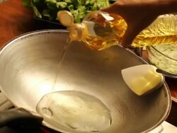 HD: Pouring oil into the pan. Stock Footage