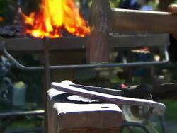 Blacksmith at work with hammer Stock Footage