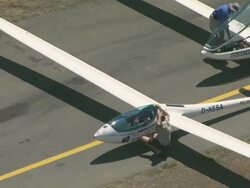 2010 AERIAL Spectators looking at gliders on the runway / Santiago de Chile, Gran Santiago, Chile Stock Footage