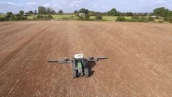 Tractor Ploughing Field, Aerial View Stock Footage