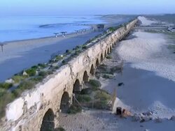 Aerial the Roman Aqueduct of ancient Caesarea, Israel Stock Footage