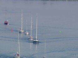 AERIAL MS ZO View of few boats flowing in river / Schleimuende, Schleswig-Holstein, Germany Stock Footage