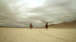 (Slow Motion) Riding Horses in the Dessert 01 Stock Footage