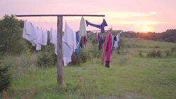 Clothing drying in the wind on sunset Stock Footage