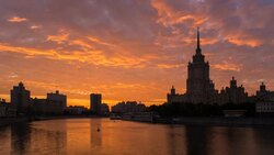 Russia, Moscow, Moskva river, Hotel Ukraine - one of the seven sister skyscrapers, built in Moscow at the end of Stalin's reign (early 1950s - Time lapse) Stock Footage