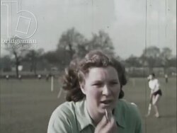 Green Islands, 1954, part 5 - hockey, netball and football played by young people in London park Stock Footage