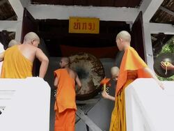 MS Monks playing   drums in  temple  AUDIO / Luang Prabang, Luang Prabang, Laos Stock Footage