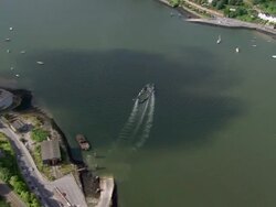 Aerial wide shot zoom out ferry crossing Cork Harbour/ Cork, Ireland Stock Footage