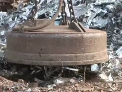 CU ZO POV Magnet lifting steel scrap at scrapyard / Bous, Saarland, Germany Stock Footage
