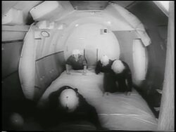 B/W 1959 first astronauts flipping around in zero gravity on training parabolic flight / newsreel Stock Footage
