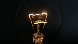 HD: Swinging LIght Bulb Stock Footage