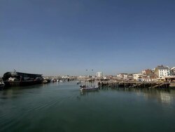 HARBOUR FISHING BOATS AND PLEASURE BOAT RIDES Stock Footage