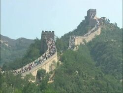 WA Great Wall of China crowded with tourists, snaking up hill, Badaling, China Stock Footage