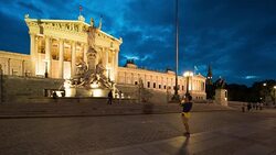 Time Lapse, Tourist waking at Austrian Parliament Building at dusk Stock Footage
