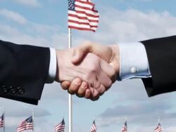 CU SLO MO Two men shaking hands in front of American flags / Washington, DC, USA Stock Footage