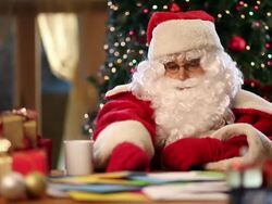 Santa Claus reading childrenÂ’s letters. Stock Footage