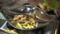 Sweet Shop & People Buying Sweeties News Clip