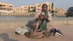 Snake Charmer on Clifton Beach, Karachi Stock Footage