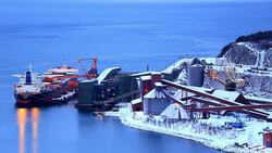 Narvik Iron ore Mining Factory with shipping boat Stock Footage