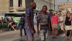 CLEAN : From buildings to cars to clothes US flags are all over Cuba News Clip